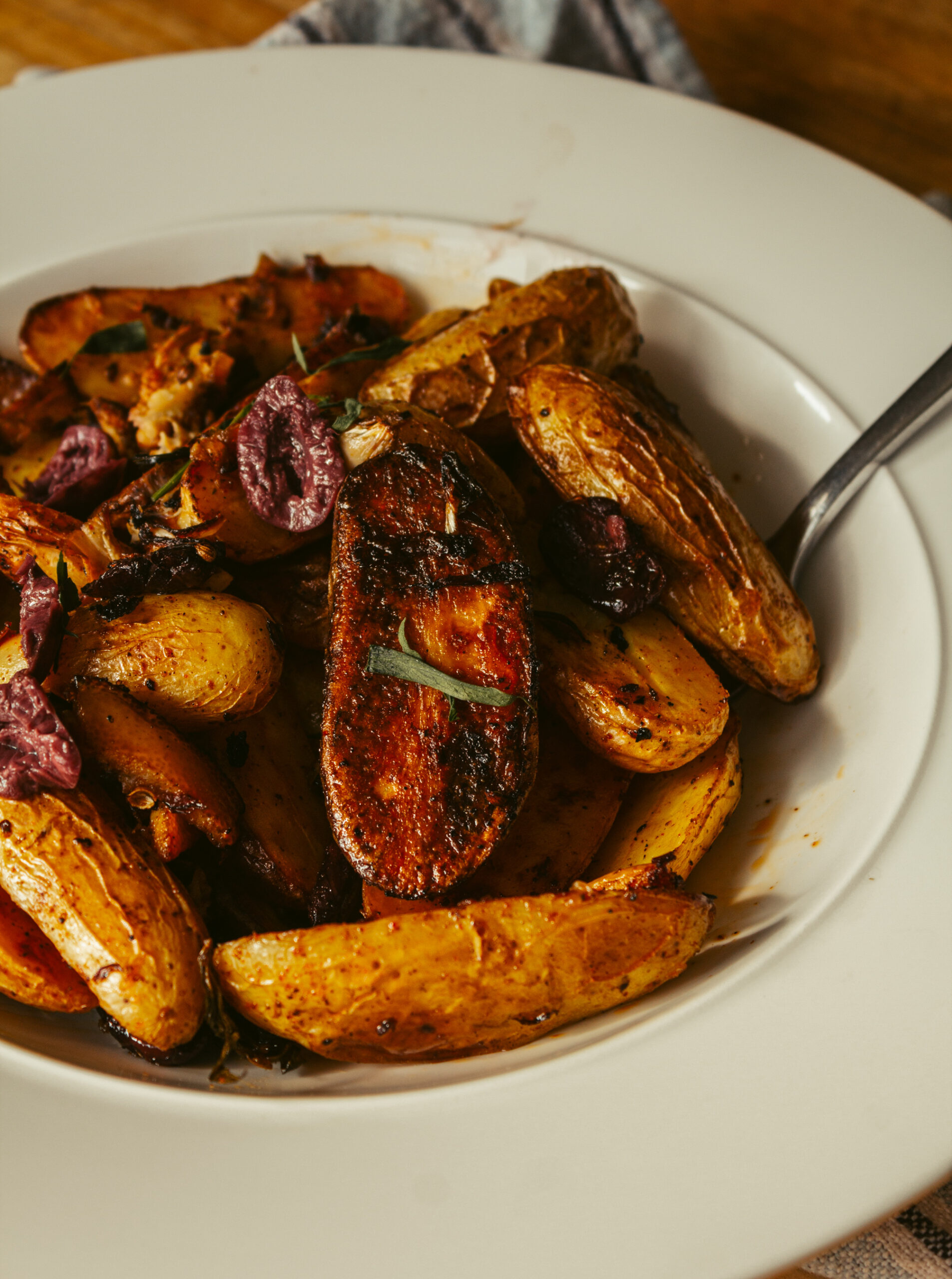 picture of a large bowl of roasted potatoes with artichokes